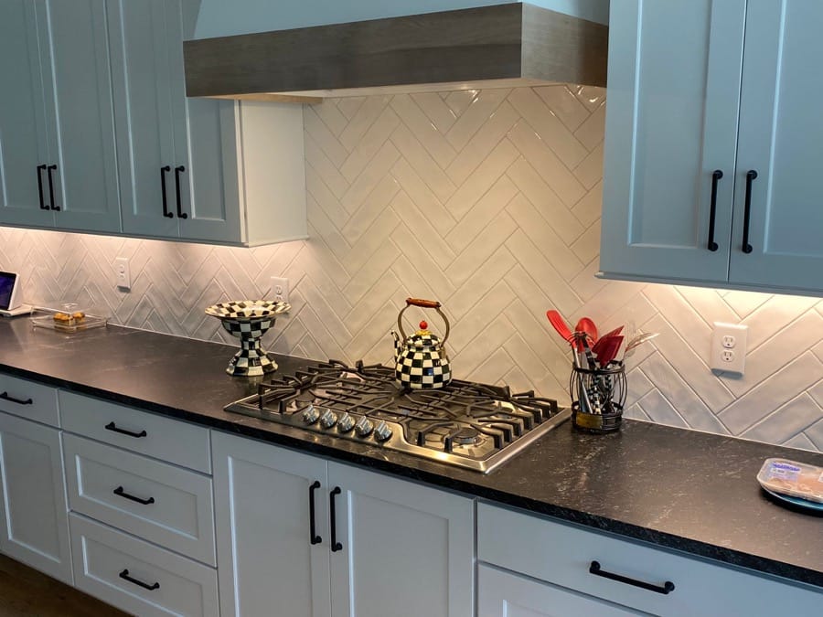 white tile kitchen backsplash